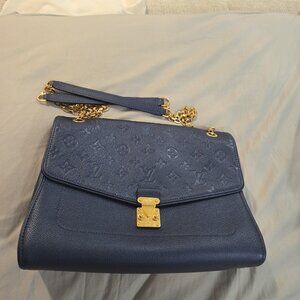 LV st Germaine Monogram Empreinte Leather